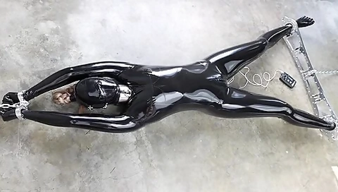 Rubber-bound Girl In Electro Play